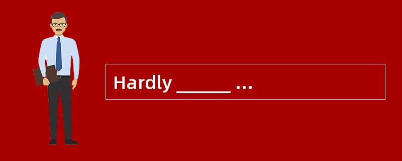 Hardly ______ down ______ the phone rang
